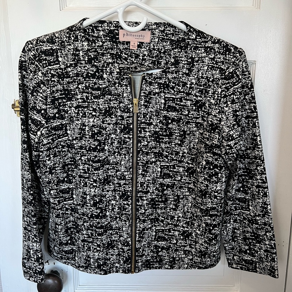 Black and White Blazer with shoulder pads. Very flattering! Only worn once